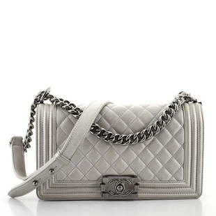 Chanel Boy Flap Bag Quilted Goatskin Old Medium: Chanel Boy Flap Bag Quilted Goatskin Old Medium Exterior Color: Silver Interior Color: Gray Exterior Material: Leather Interior Material: Fabric Hardware Color: Silver Accessories: