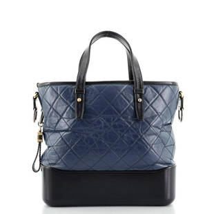 Chanel Gabrielle Shopping Tote Quilted Calfskin Medium: Chanel Gabrielle Shopping Tote Quilted Calfskin Medium Exterior Color: Blue Interior Color: Red Exterior Material: Leather Interior Material: Fabric Hardware Color: Gold, Silver, Aged