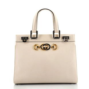 Gucci Zumi Top Handle Bag Leather Small: Gucci Zumi Top Handle Bag Leather Small Exterior Color: Neutral Interior Color: Red Exterior Material: Leather Interior Material: Leather Hardware Color: Gold, Silver Accessories: