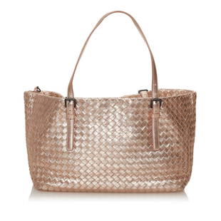 Bottega Veneta Intrecciato Leather Tote Bag: Bottega Veneta Intrecciato Leather Tote Bag Condition Quality: Fair Color: Silver Height: 8 in. Length: 11.5 in. Material: Calf Width: 6.25 in. Item Condition: Pre Owned SKU: