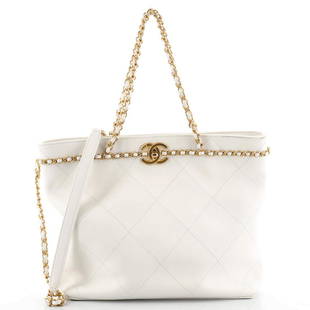 Chanel CC Lock Chain Handle Shopping Tote Quilted Calfskin Small: Chanel CC Lock Chain Handle Shopping Tote Quilted Calfskin Small Exterior Color: White Interior Color: Black Exterior Material: Leather Interior Material: Fabric Hardware Color: Gold 