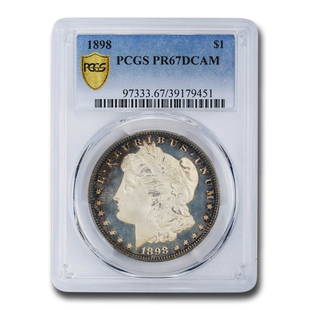 1898 Morgan Dollar PR-67 DCAM PCGS: 1898 Morgan Dollar PR-67 DCAM PCGS Product ID: 179657 Year: 1898 Grade Service: PCGS Denomination: $1.00 Metal Content: 0.7734 troy oz Purity: .900 Thickness: 3.1 mm Diameter: 38.1 mm