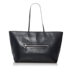 Fendi Monster Roll Leather Tote Bag: Fendi Monster Roll Leather Tote Bag Condition Quality: Fair Color: Black Height: 10.25 in. Length: 13.25 in. Material: Calf Width: 5.25 in. Item Condition: Pre Owned SKU: