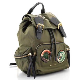 Burberry Rucksack Backpack Patch Embellished Nylon Medium: Burberry Rucksack Backpack Patch Embellished Nylon Medium Exterior Color: Green Interior Color: Black Exterior Material: Nylon Interior Material: Fabric Hardware Color: Gold 