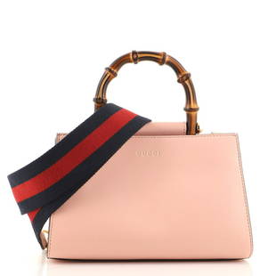 Gucci Nymphaea Top Handle Bag Leather Mini: Gucci Nymphaea Top Handle Bag Leather Mini Exterior Color: Pink Interior Color: Gray Exterior Material: Leather Interior Material: Microfiber Hardware Color: Gold Accessories: Dust