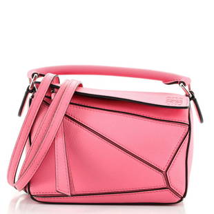 Loewe Puzzle Bag Leather Mini: Loewe Puzzle Bag Leather Mini Exterior Color: Pink Interior Color: Neutral Exterior Material: Leather Interior Material: Fabric Hardware Color: Silver Accessories: Detachable Strap 