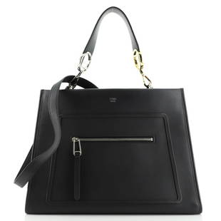Fendi Runaway Bag Leather Regular: Fendi Runaway Bag Leather Regular Exterior Color: Black Interior Color: Brown Exterior Material: Leather Interior Material: Microfiber Hardware Color: Gold, Silver Accessories: