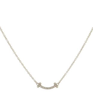 Tiffany & Co. T Smile Pendant Necklace 18K White Gold with Diamonds Mini: Tiffany & Co. T Smile Pendant Necklace 18K White Gold with Diamonds Mini Metal Type: 18K White Gold Metal Finish: High Polish Hallmarks Type: 750, Designer Signature Signature / Hallmark