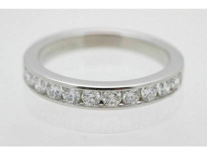 Tiffany & Co Platinum And Diamond Wedding Band Ring 2.5mm: Tiffany & Co Platinum And Diamond Wedding Band Ring 2.5mm SKU: RBJ184365402466-E Brand: Tiffany & Co. Condition: Pre-Owned Metal: Platinum Stone: Diamond Model: 184365402466-E Item