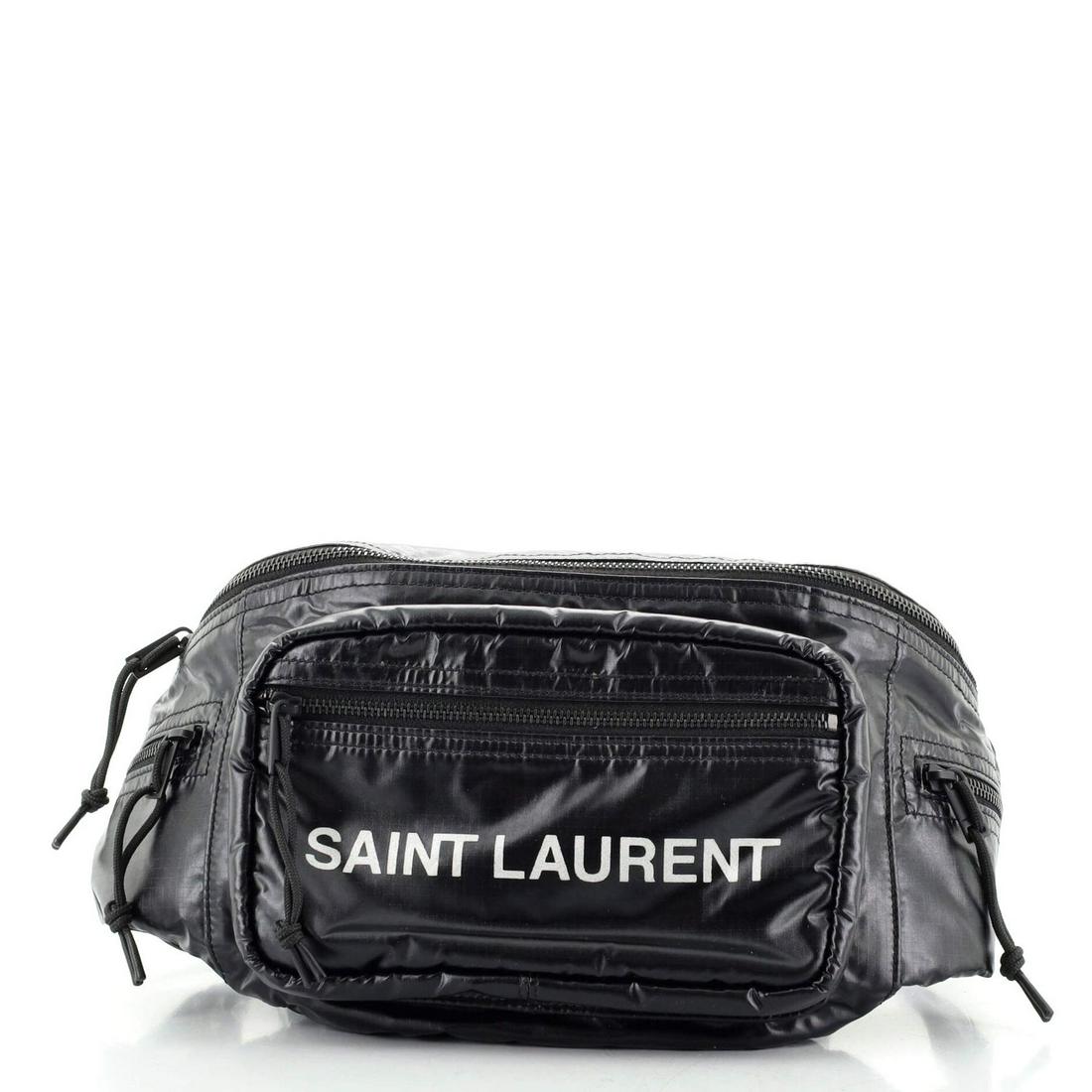 Saint Laurent Nuxx Waist Bag Nylon: Saint Laurent Nuxx Waist Bag Nylon Ref. no: HB.SL.NUXE.NY Item No: 122596/114 Brand Code: GAB.581375.0819 SIZE AND FIT: 10"W x 6.5"H x 2"D, 16" strap drop Exterior Color: Black Interior Color: Bla