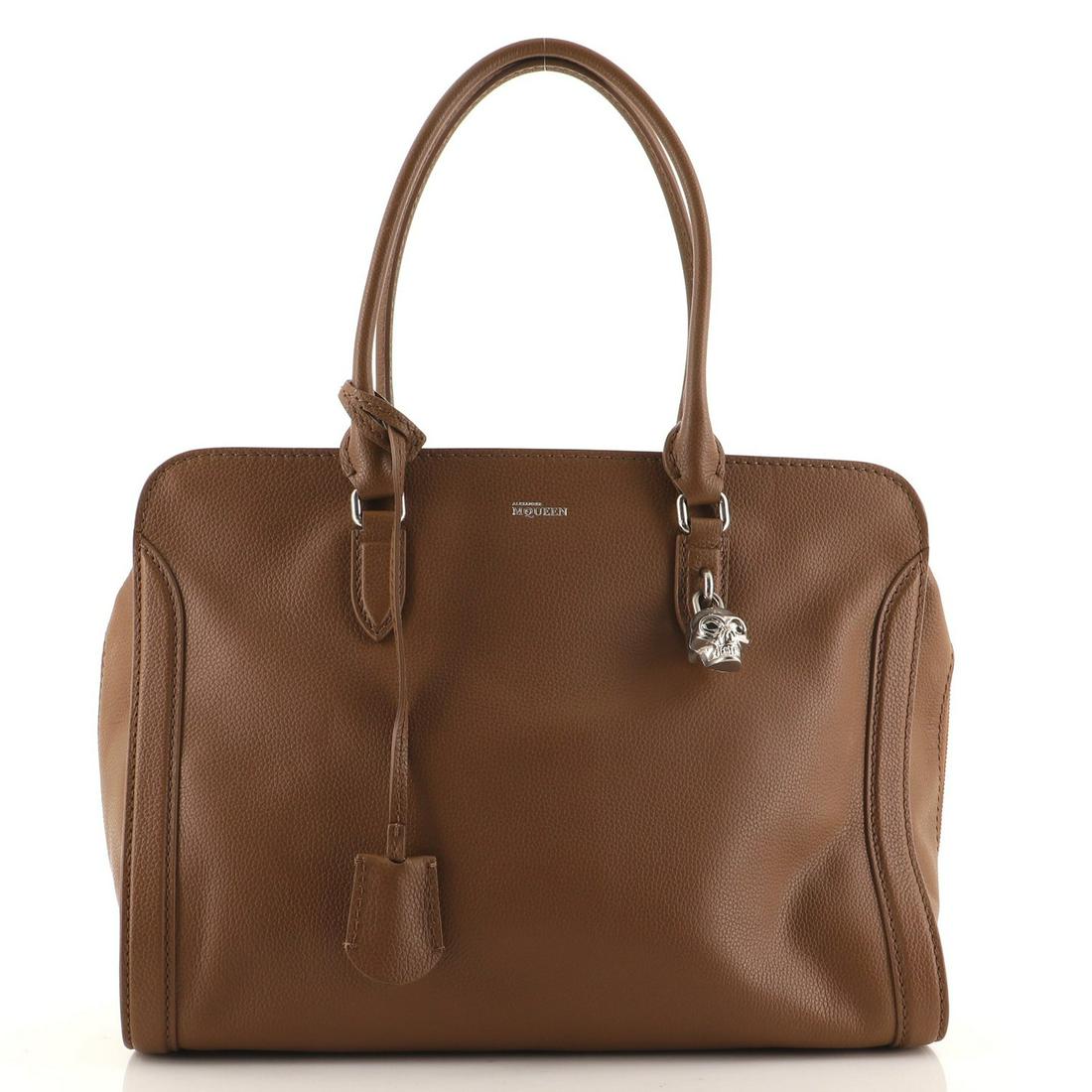 Alexander McQueen Padlock Zip Around Tote Leather Medium: Alexander McQueen Padlock Zip Around Tote Leather Medium Exterior Color: Brown Interior Color: Black Exterior Material: Leather Interior Material: Fabric Hardware Color: Aged Silver Accessories: C
