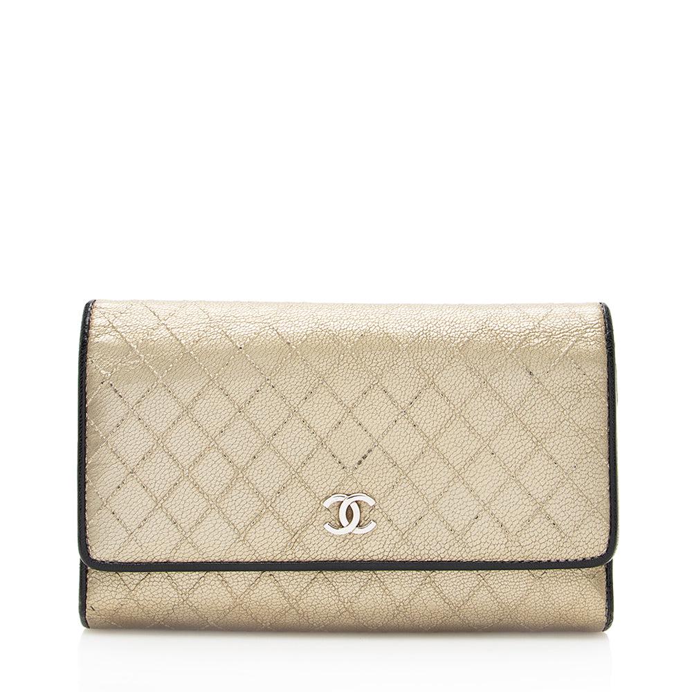 Chanel Metallic Calfskin Flap Wallet: Chanel Metallic Calfskin Flap Wallet Condition Quality: Fair Color: Gold Height: 4.25 in. Length: 6.25 in. Material: Metallic Calfskin Width: 1 in. Item Condition: Pre Owned SKU: