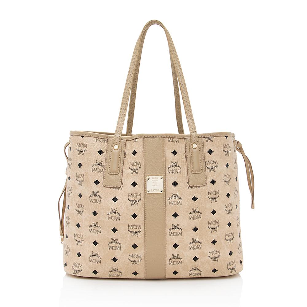 MCM Visetos Liz Reversible Medium Shopper Tote: MCM Visetos Liz Reversible Medium Shopper Tote Condition Quality: Good Color: Beige Height: 11 in. Length: 14 in. Material: Coated Canvas/Leather Width: 6 in. Item Condition: Pre Owned <b