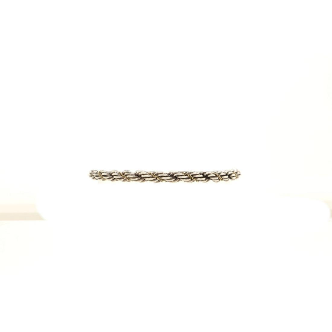Tiffany & Co. Rope Chain Bracelet Sterling Silver with 18K Yellow Gold: Tiffany & Co. Rope Chain Bracelet Sterling Silver with 18K Yellow Gold Metal Type: 18K Yellow Gold, Sterling Silver Hallmarks Type: 750, 925, Designer Signature Signature / Hallmark Location: Clasp, T
