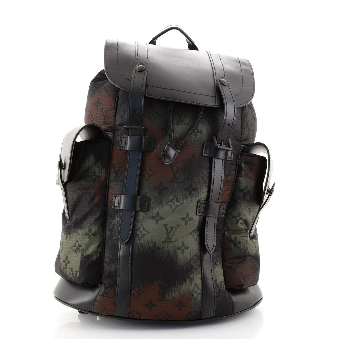 Louis Vuitton Christopher Backpack Limited Edition Camouflage Monogram Nylon with Leather PM: Louis Vuitton Christopher Backpack Limited Edition Camouflage Monogram Nylon with Leather PM Exterior Color: Black, Brown, Green, Print Interior Color: Black Exterior Material: Nylon, Leather Interior