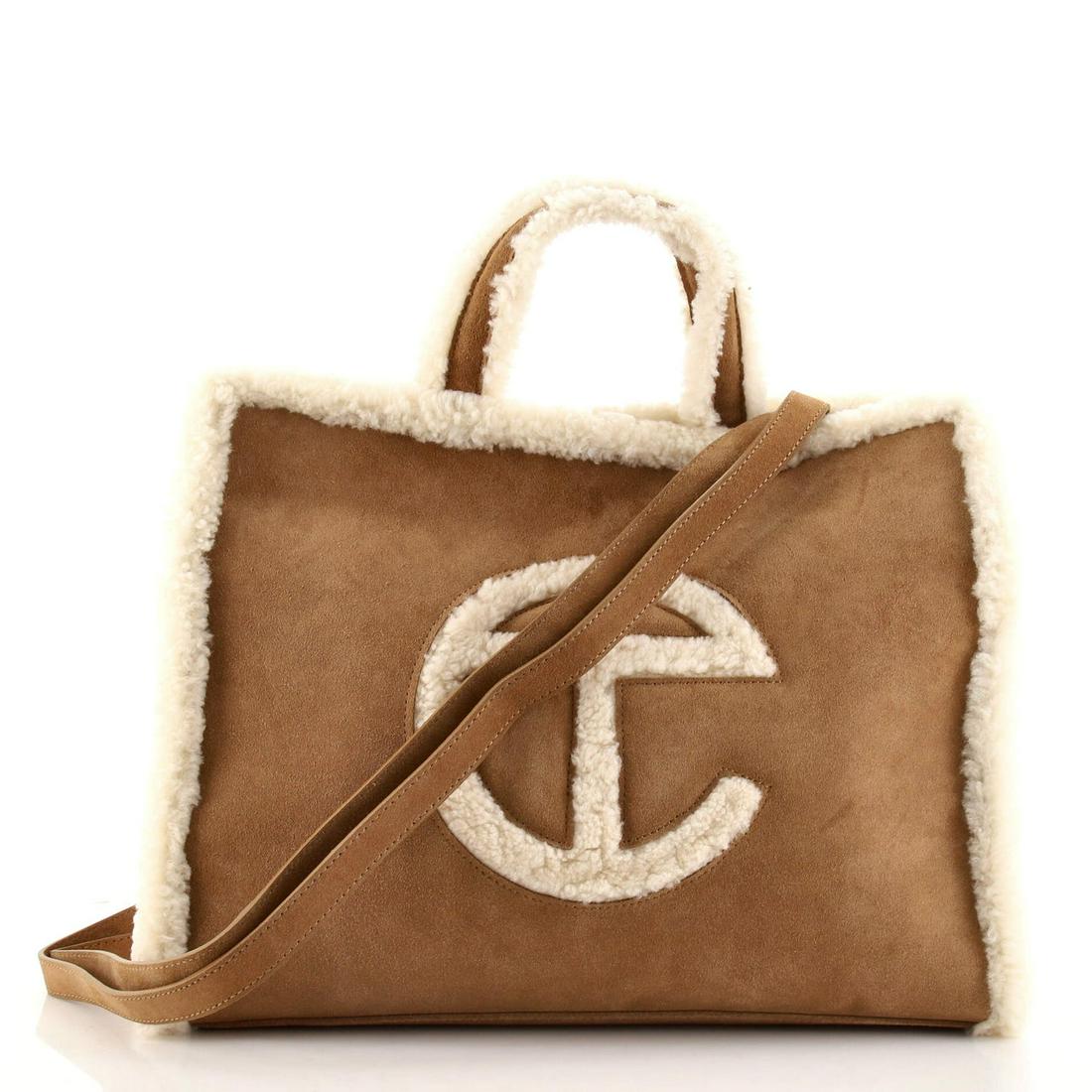 Telfar UGG Shopping Tote Suede with Shearling Medium: Telfar UGG Shopping Tote Suede with Shearling Medium Exterior Color: Brown Interior Color: Brown Exterior Material: Shearling, Suede Interior Material: Fabric Hardware Color: Silver Accessories: D