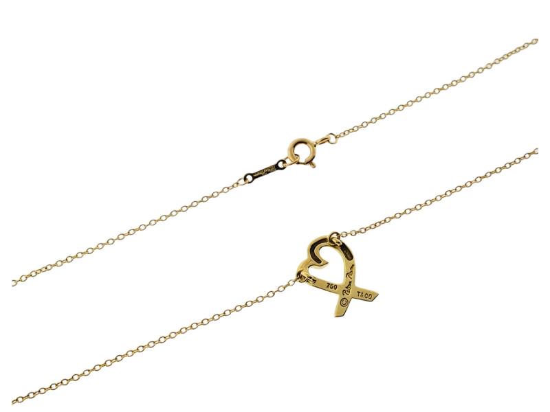 Tiffany & Co 18K Yellow Gold Paloma Picasso Small Loving Heart Necklace: Tiffany & Co 18K Yellow Gold Paloma Picasso Small Loving Heart Necklace Item Specifics:Base Metal: Yellow Gold, 18kBrand: Tiffany & Co.Chain Type: RoloColor: Yellow GoldCountry of Origin: ItalyCountry
