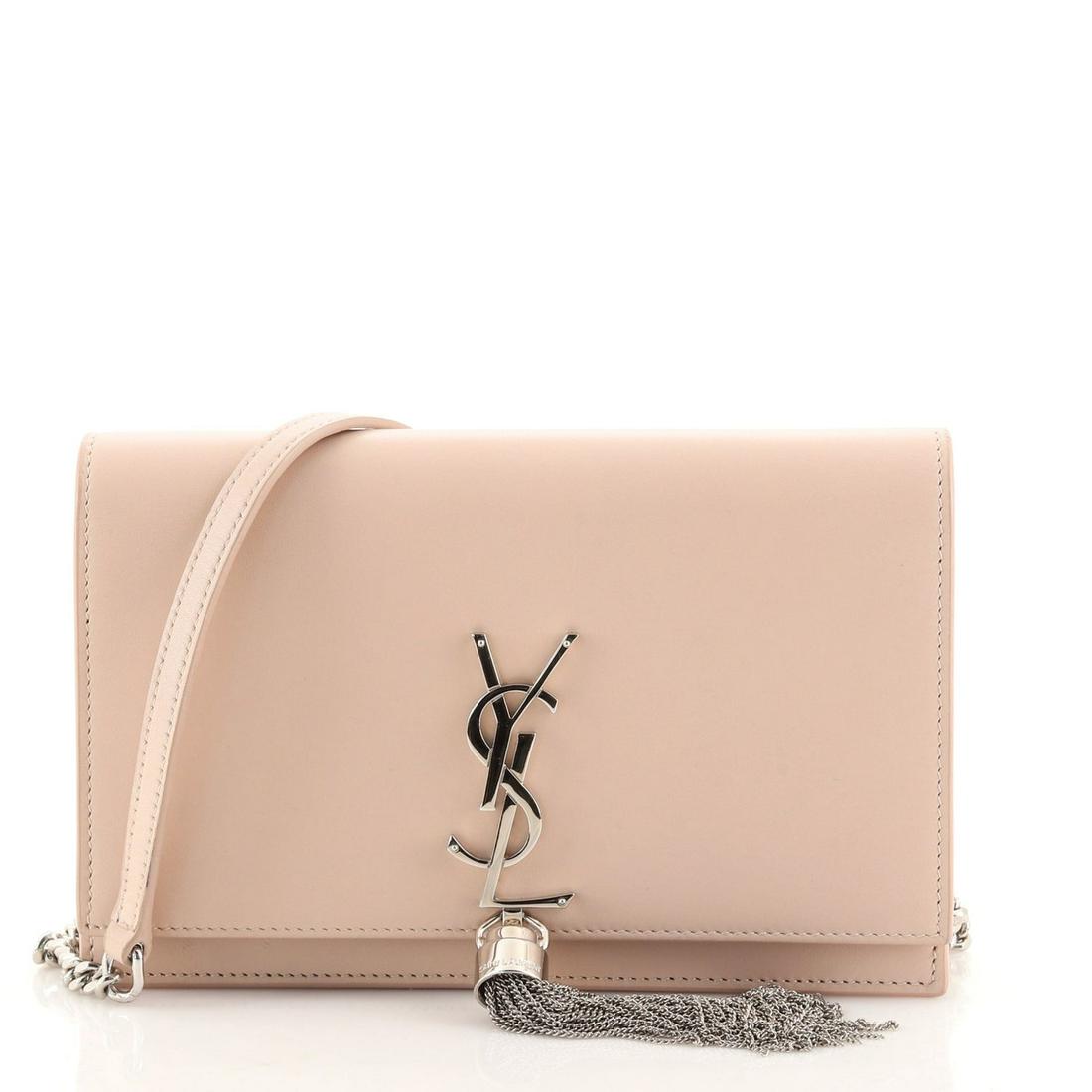 Saint Laurent Classic Monogram Tassel Chain Wallet Leather: Saint Laurent Classic Monogram Tassel Chain Wallet Leather Exterior Color: Neutral Interior Color: Black Exterior Material: Leather Interior Material: Leather Hardware Color: Silver Accessories: D