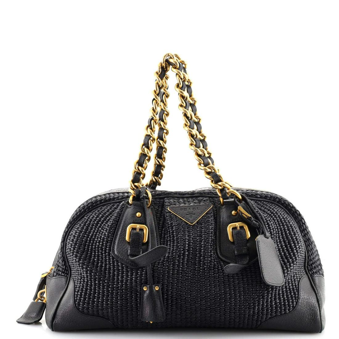 Prada Buckle Pleated Bowler Bag Raffia Large: Prada Buckle Pleated Bowler Bag Raffia Large Exterior Color: Black Interior Color: Black Exterior Material: Leather, Raffia Interior Material: Fabric Hardware Color: Gold Accessories: Lock, Luggag