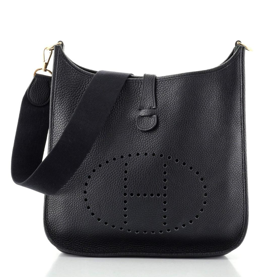 Hermes Evelyne Bag Gen I Fjord GM: Hermes Evelyne Bag Gen I Fjord GM RBJ No: HB.HM.EVCI.FJ.GM Item No: 132682/1 Brand Code: C Square (1999) SIZE AND FIT: 12.5"W x 12"H x 3.5"D, 18" handle drop Exterior Color: Black Interior Color: