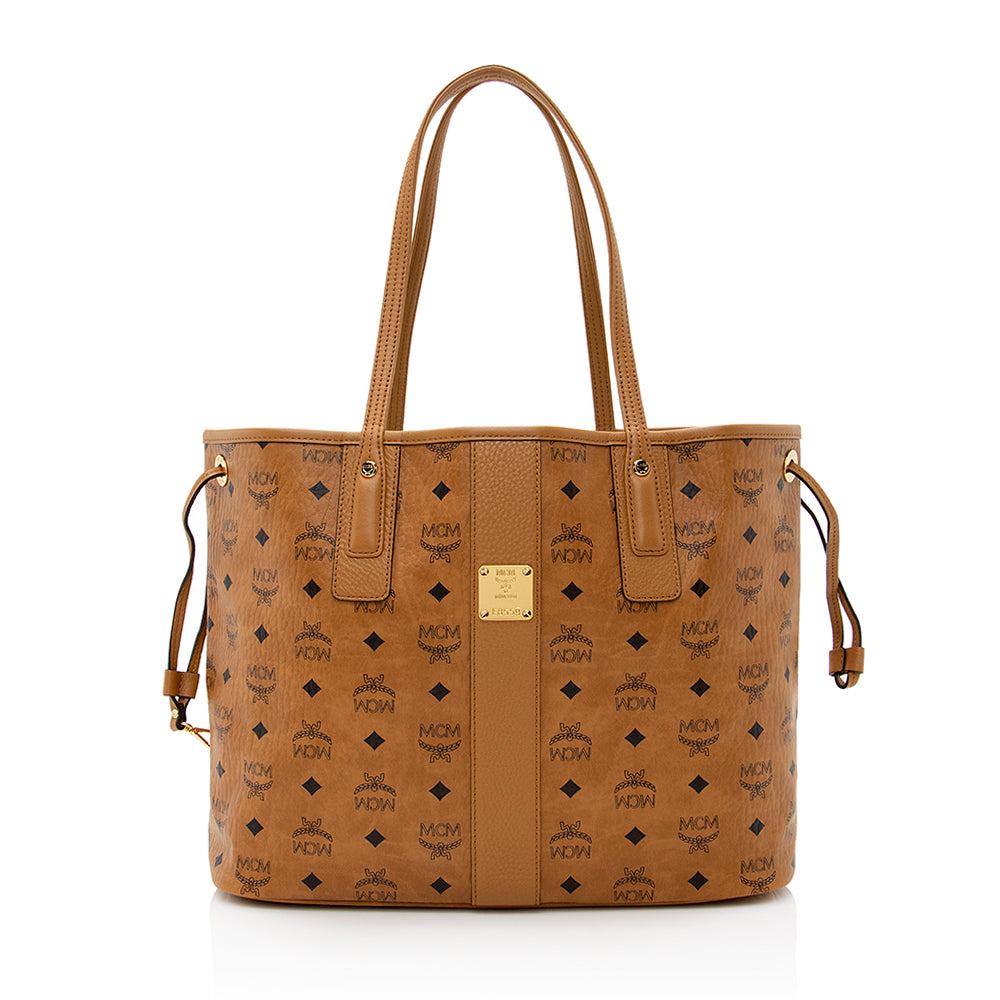 MCM Visetos Liz Reversible Medium Shopper Tote: MCM Visetos Liz Reversible Medium Shopper Tote Condition Quality: Excellent Color: Brown Height: 11 in. Length: 14 in. Material: Coated Canvas/Leather Width: 6 in. Item Condition: Pre Own