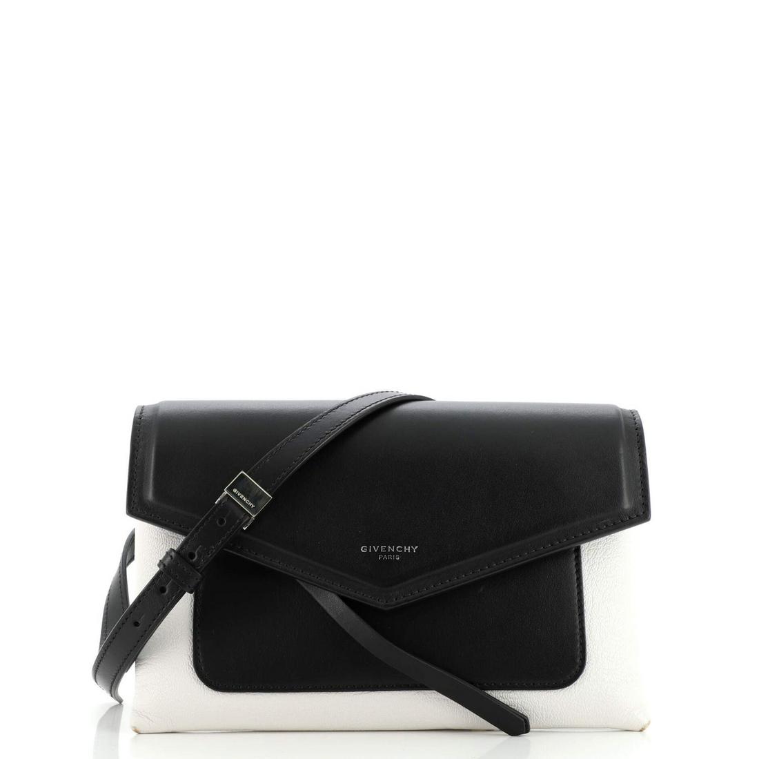 Givenchy Duetto Crossbody Bag Leather: Givenchy Duetto Crossbody Bag Leather Exterior Color: Black Interior Color: Black Exterior Material: Leather Interior Material: Fabric Hardware Color: Silver Accessories: No accessories R