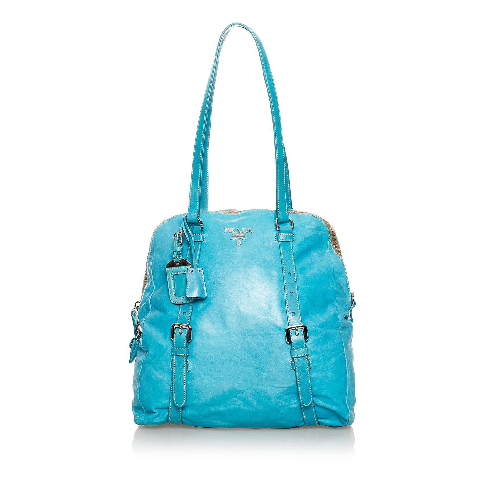 Prada Leather Tote Bag: Prada Leather Tote Bag Founded by Mario Prada in 1913, the Italian fashion label of Prada is renowned for its original, yet practical designs. Each piece of the collection is meticulously crafted with