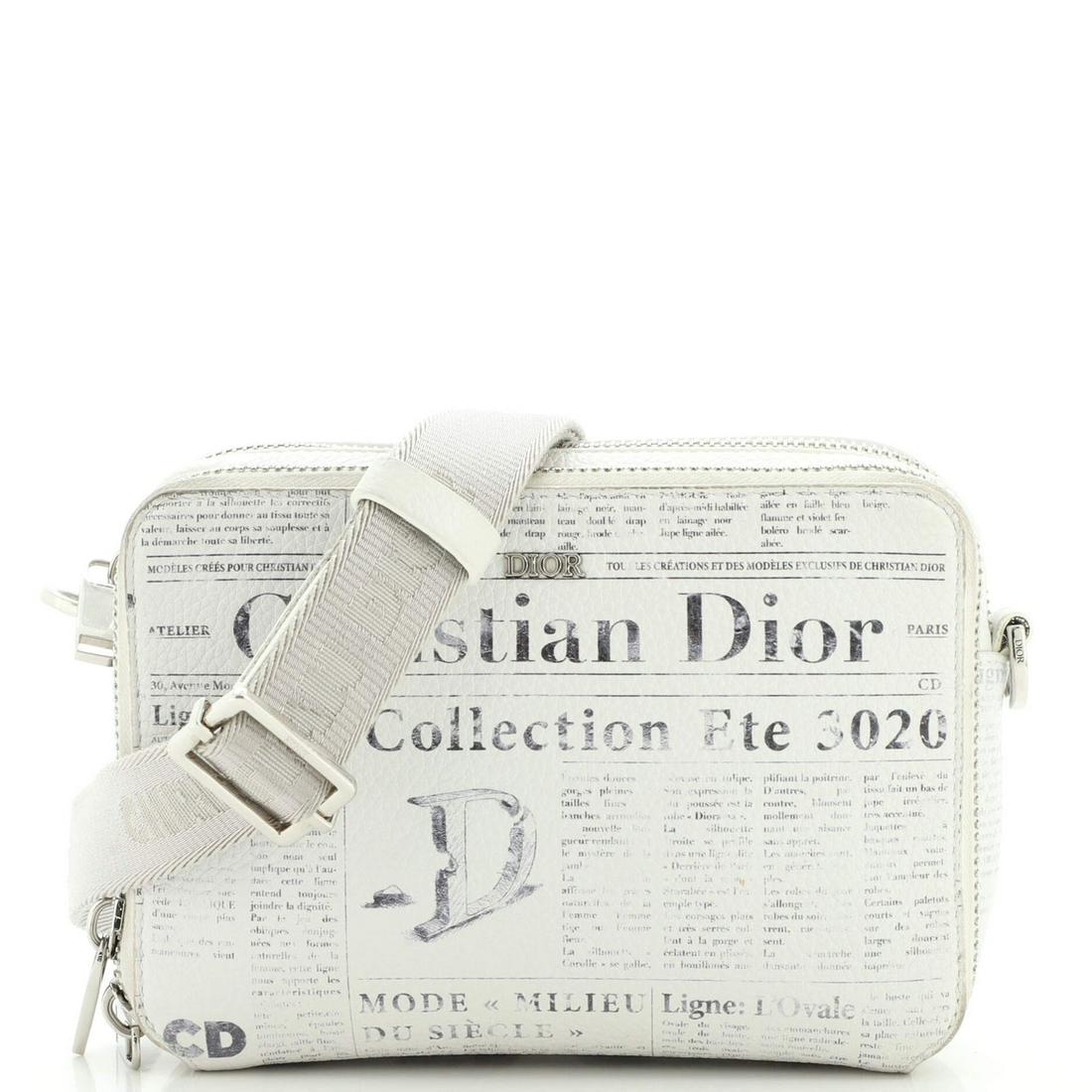 Christian Dior Daniel Arsham Double Zip Crossbody Pouch Newspaper Print Leather: Christian Dior Daniel Arsham Double Zip Crossbody Pouch Newspaper Print Leather Exterior Color: Print, White Interior Color: Black Exterior Material: Leather Interior Material: Fabric Hardware Color:
