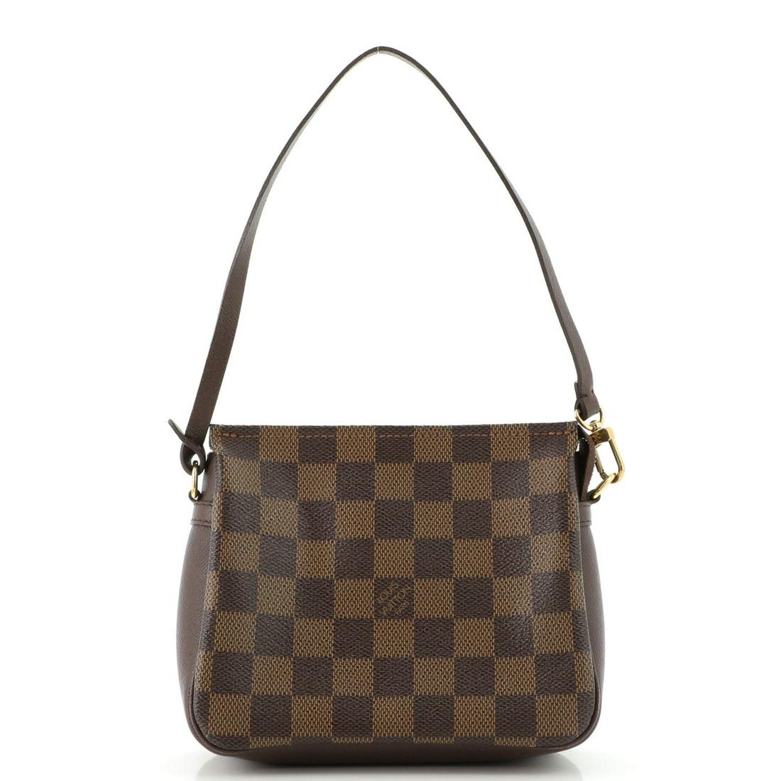 Louis Vuitton Trousse Make Up Bag Damier: Louis Vuitton Trousse Make Up Bag Damier Exterior Color: Brown Interior Color: Orange Exterior Material: Canvas Coated Interior Material: Fabric Hardware Color: Gold Accessories: No Accessories, D