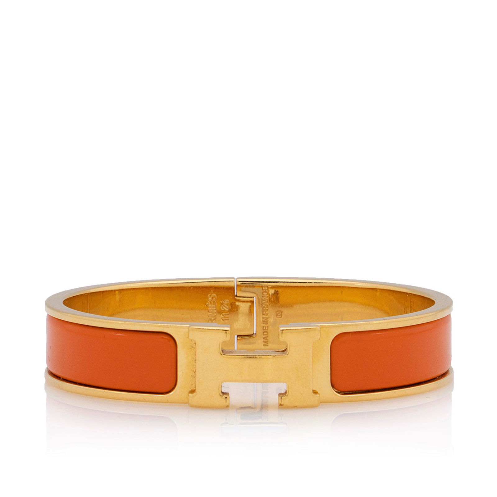 Hermes Clic Clac H Narrow Bracelet: Hermes Clic Clac H Narrow Bracelet Condition Quality: Fair Color: Gold/Red Material: Enamel/Gold Tone Metal Width: 0.5 in. Item Condition: Pre Owned SKU: SHF-23179