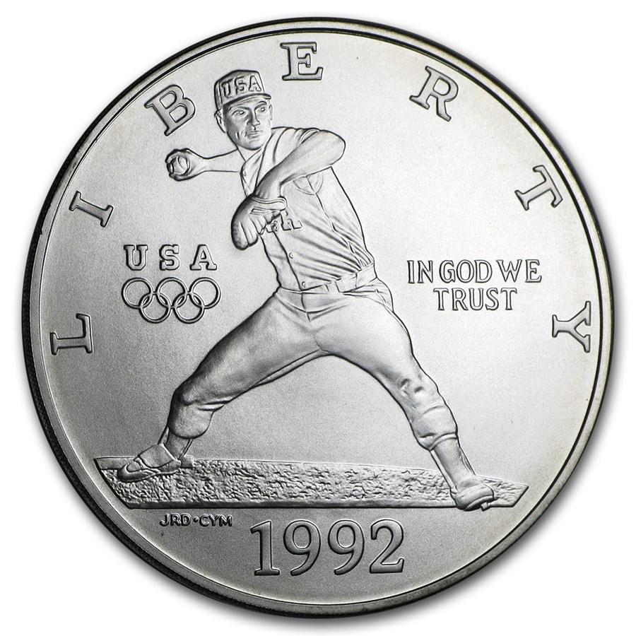 1992-D Olympic Baseball $1 Silver Commem BU (Capsule Only): 1992-D Olympic Baseball $1 Silver Commem BU (Capsule Only) Product ID: 42809 Year: 1992 Grade: Brilliant Unc Grade Service: None Denomination: $1.00 Dollar Mint Mark: D - Denver Metal Con