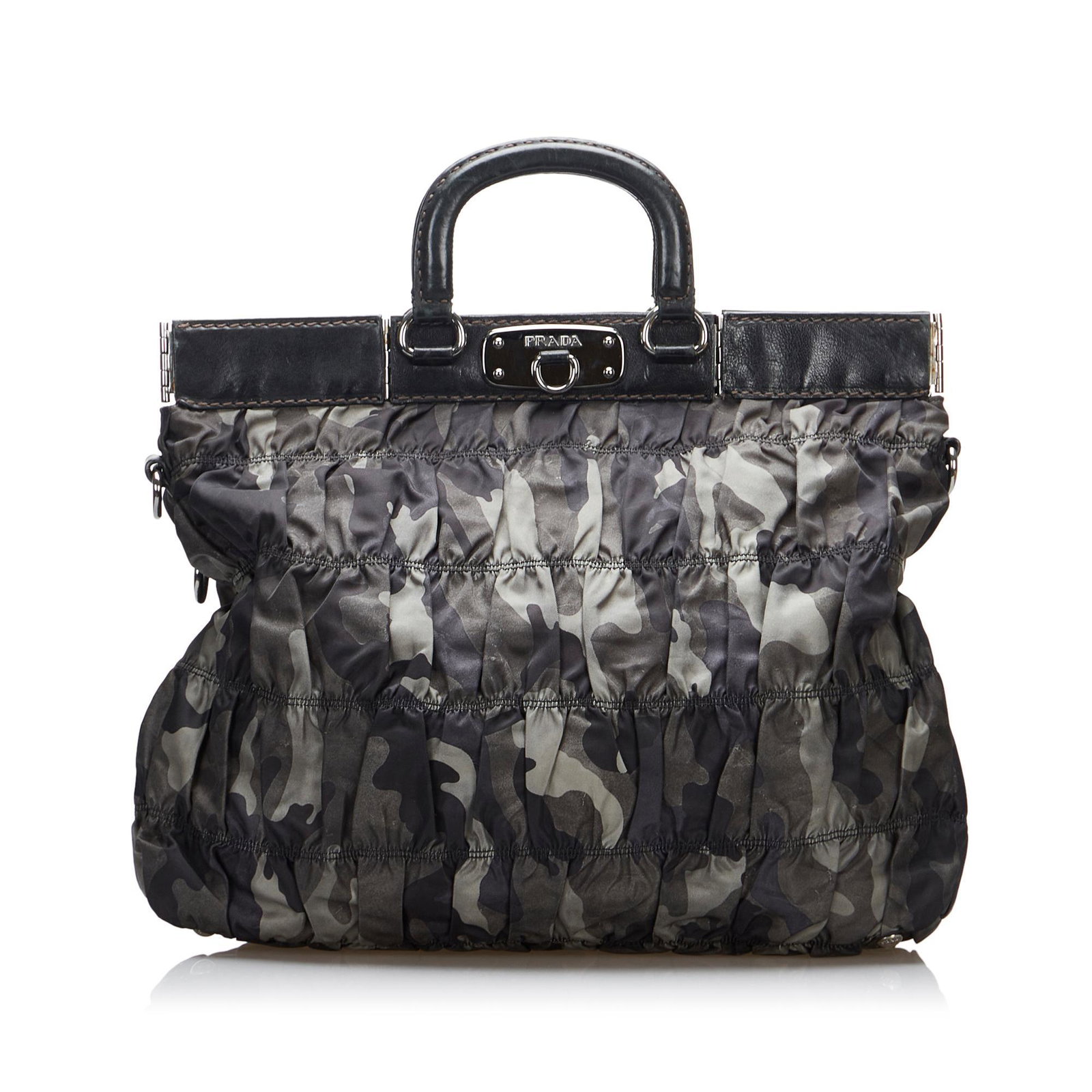 Prada Tessuto Gaufre Camouflage Business Bag: Prada Tessuto Gaufre Camouflage Business Bag Founded by Mario Prada in 1913, the Italian fashion label of Prada is renowned for its original, yet practical designs. Each piece of the collection is met