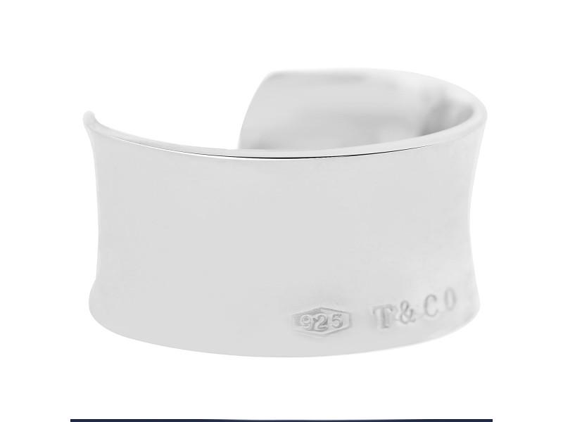 Tiffany & Co. Silver Cuff Bracelet: Tiffany & Co. Silver Cuff Bracelet RBJ no: 20296CR Brand: Tiffany & Co. Condition: Pre-Owned Metal: Silver ---- Brand: Tiffany & Co.Gender: WomensCondition: Pre-OwnedMetal: Silver