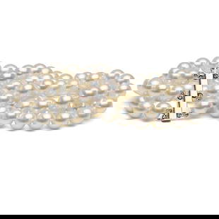 White Japanese Akoya Triple Strand Pearl Bracelet, 6.5-7.0mm: White Japanese Akoya Triple Strand Pearl Bracelet, 6.5-7.0mm AAA / 14kt Yellow Gold