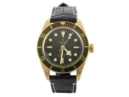 Tudor Black Bay Fifty-Eight Yellow Gold Green Dial 39mm Full Set Unworn: Tudor Black Bay Fifty-Eight Yellow Gold Green Dial 39mm Full Set Unworn Product Code: 304456420768-E Brand: Tudor Condition: Pre-Owned Model: Tudor Black Bay Item Specifics:Band Color: BrownBand Mater