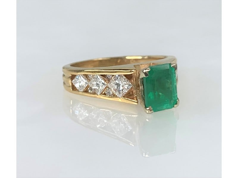 14K Yellow Gold Emerald Cut Emerald Diamond Ring: 14K Yellow Gold Emerald Cut Emerald Diamond Ring Product Code: 14KYELLOWG-61F709D536944 Condition: Never Worn Metal: Yellow Gold Stone: Emerald, Diamond A one-of-a-kind vintage natural emerald ring fe