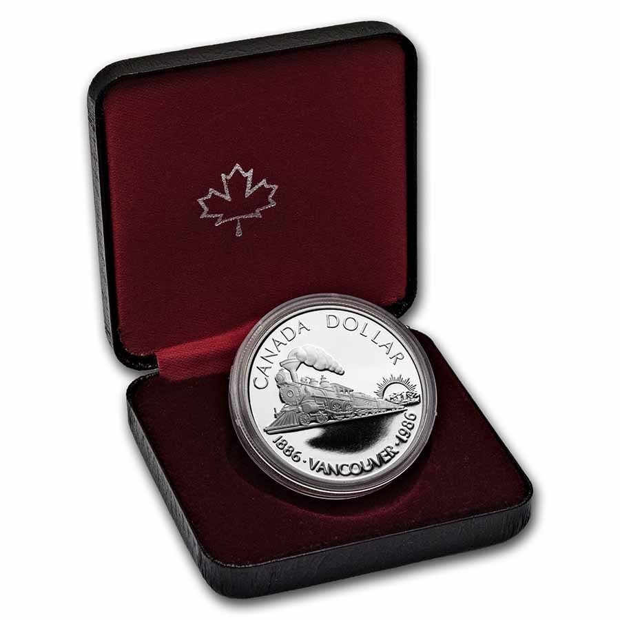 1986 Canada Silver Dollar Proof (100th Ann Transcont. Rail w/OGP): 1986 Canada Silver Dollar Proof (100th Ann Transcont. Rail w/OGP) Product ID: 232096 Year: 1986 Grade: Proof Grade Service: Other Denomination: $1.00 Dollar Mint Mark: RCM (Not Shown) Met