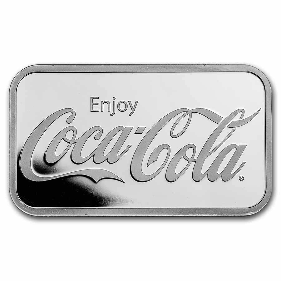 Coca-Cola 1 oz Silver Struck Bar: Coca-Cola 1 oz Silver Struck Bar Product ID: 272450 Grade: None Grade Service: None Mint Mark: N/A - Not Available Metal Content: 1 troy oz Purity: .999 Thickness: 3.1 mm Diamete