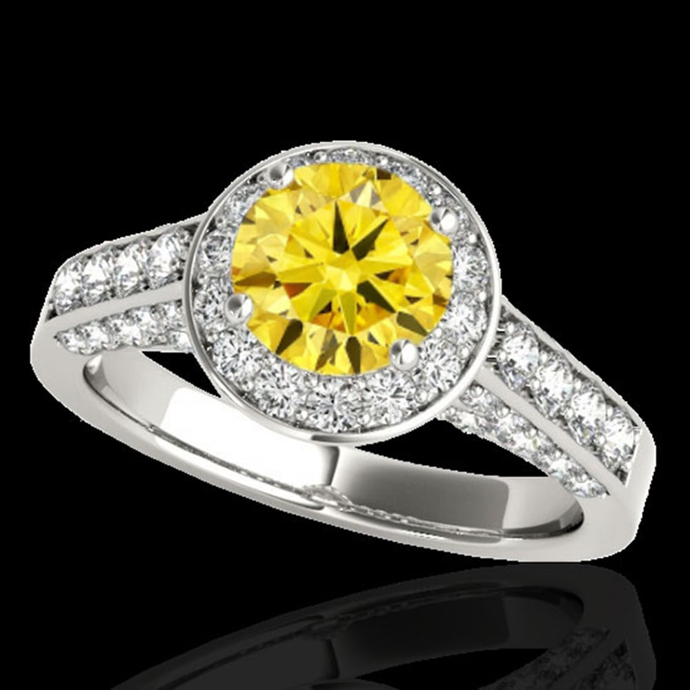 2.56 ctw Certified SI/I Fancy Intense Yellow Diamond Ring 10k White Gold: 2.56 ctw Certified SI/I Fancy Intense Yellow Diamond Ring 10k White Gold Item: Diamond Wedding Ring Total Gem weight: 2.56 carats Metal: Solid 10k White Gold Gold Product Weight: Approx. 6.3 grams <