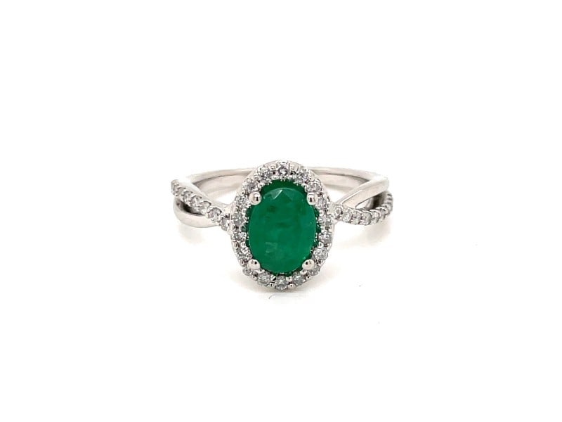 Oval Shaped Emerald And Diamonds Twist Shank Ring In 14K White Gold: Oval Shaped Emerald And Diamonds Twist Shank Ring In 14K White Gold Product Code: 14KWHITEGO-6283B186D78AF Condition: Never Worn Final Sale: THIS ITEM IS FINAL SALE AND NOT RETURNABLE. The oval rich g