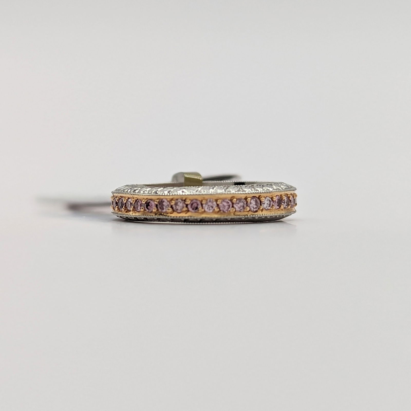 Estate Michael Beaudry Pink Diamond Eternity Ring in 18K Rose Gold: Estate Michael Beaudry Pink Diamond Eternity Ring in 18K Rose Gold Metal: Rose Gold Stone: Pink Diamond Stone Cut: Round Cut Period: 21st Century Date of Manufacture: 21st Century Condition: New <