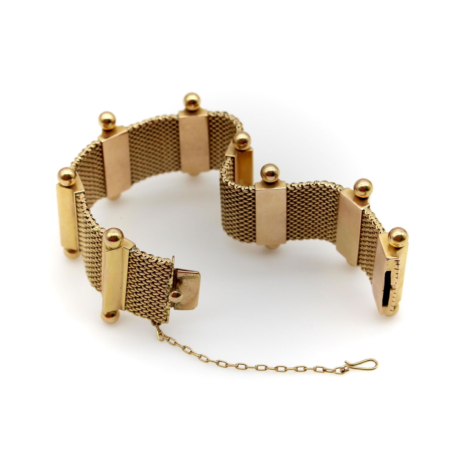 18K Woven Gold Mid-Century Modern Bracelet with Ball Finials: 18K Woven Gold Mid-Century Modern Bracelet with Ball Finials Metal: 18k Gold, Yellow Gold, Gold Weight: 64 g Dimensions: Width: 1.13 in (28.71 mm) Length: 6.25 in (158.75 mm) Style: Modern Place of Or