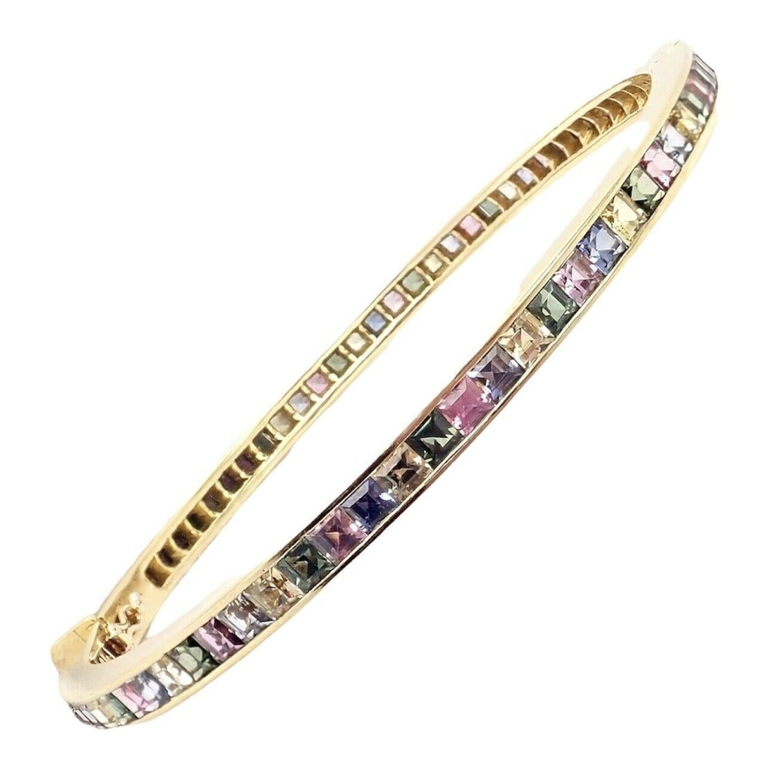 Julius Cohen Sapphire Pastel Color Stone Yellow Gold Bangle Bracelet: Julius Cohen Sapphire Pastel Color Stone Yellow Gold Bangle Bracelet Metal: 18k Gold, Yellow Gold Stone: Iolite, Sapphire, Spinel Stone Cut: Princess Cut Weight: 22.3 g Lab Report Available: AIG P