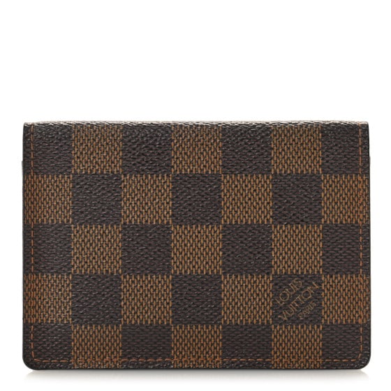 Louis Vuitton Damier Ebene ID: Louis Vuitton Damier Ebene ID Holder SKU no: RBJ1403451 Brand: LOUIS VUITTON Condition: Very Good Condition Details: Exterior: Corner wear, scuffs, edge wear, marks, Interior: Scuffs, marks Year: 2000