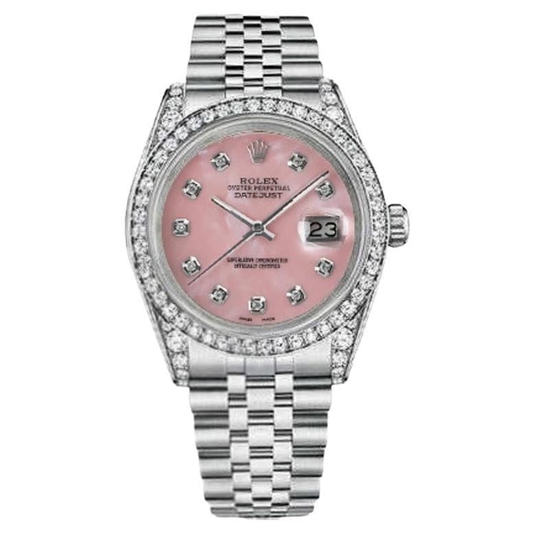 Rolex Datejust Pink Mother of: Rolex Datejust Pink Mother of Creator: Rolex Design: Datejust WatchDatejust Collection Metal: Stainless Steel Stone: Diamond Stone Cut: Round Cut Dimensions: Diameter: 1.42 in (36 mm) Place of Origin: