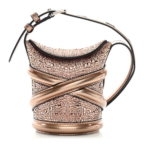 Alexander Mcqueen Metallic Calfskin Crystal Curve Bucket Bag Rose Gold: Alexander Mcqueen Metallic Calfskin Crystal Curve Bucket Bag Rose Gold This is an authentic ALEXANDER MCQUEEN Metallic Calfskin Crystal Mini Curve Bucket in Bag Rose Gold This chic crossbody features