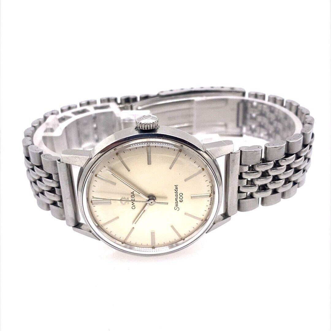 Omega Seamaster 600 Vintage Mechanical: Omega Seamaster 600 Vintage Mechanical Brand: Omega Case Material: Stainless Steel Weight: 57.3 g Strap Material: Stainless Steel Case Shape: Round Case Dimensions: Depth: 12 in (304.8 mm)