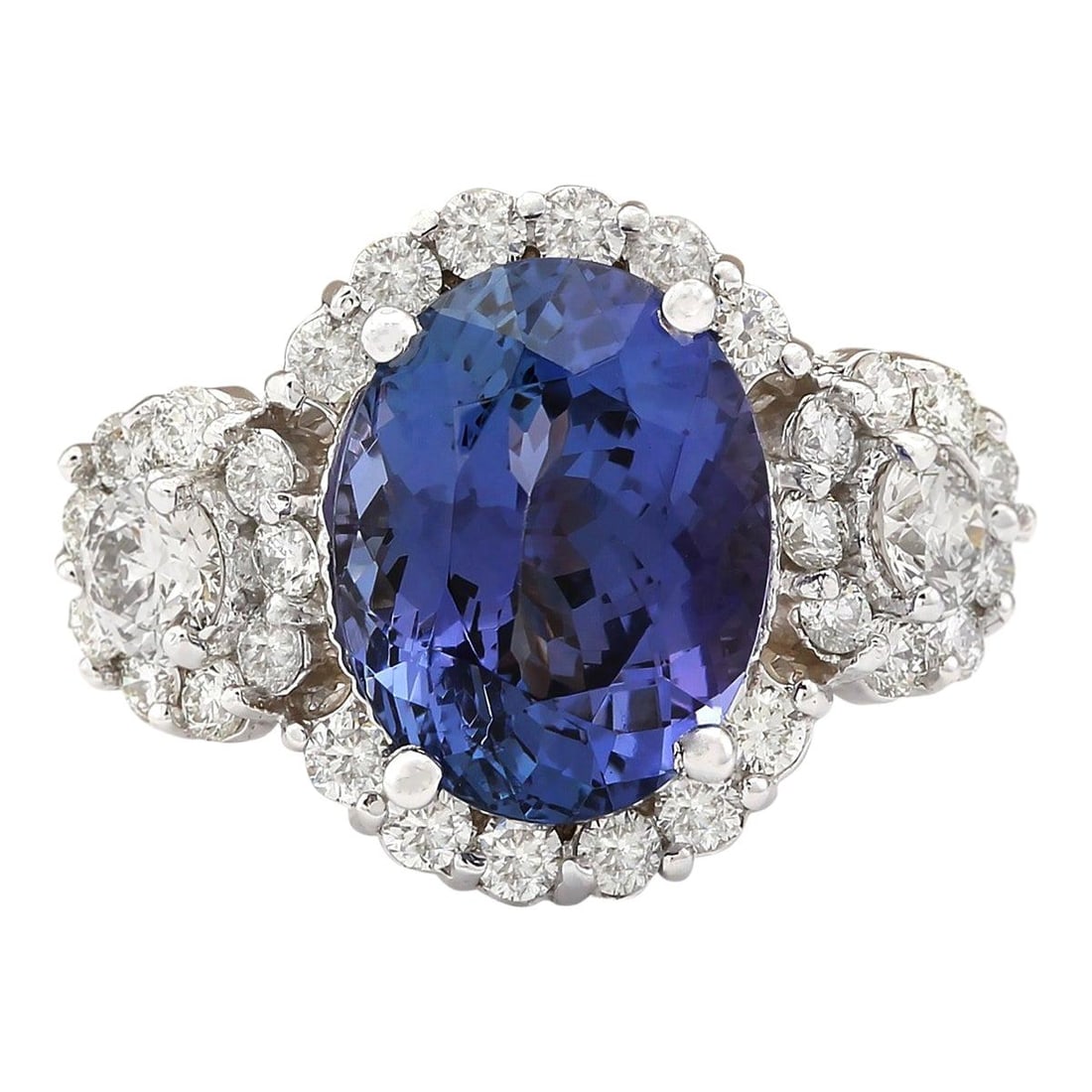 Tanzanite Diamond Ring 14K White Gold: Natural Tanzanite Diamond Ring 14K White Gold Ring Size: 7 US, Resizable Metal: 14k Gold, White Gold Stone: Diamond, Tanzanite Stone Cut: Oval Cut Place of Origin: United States Period: 2010- Date of 