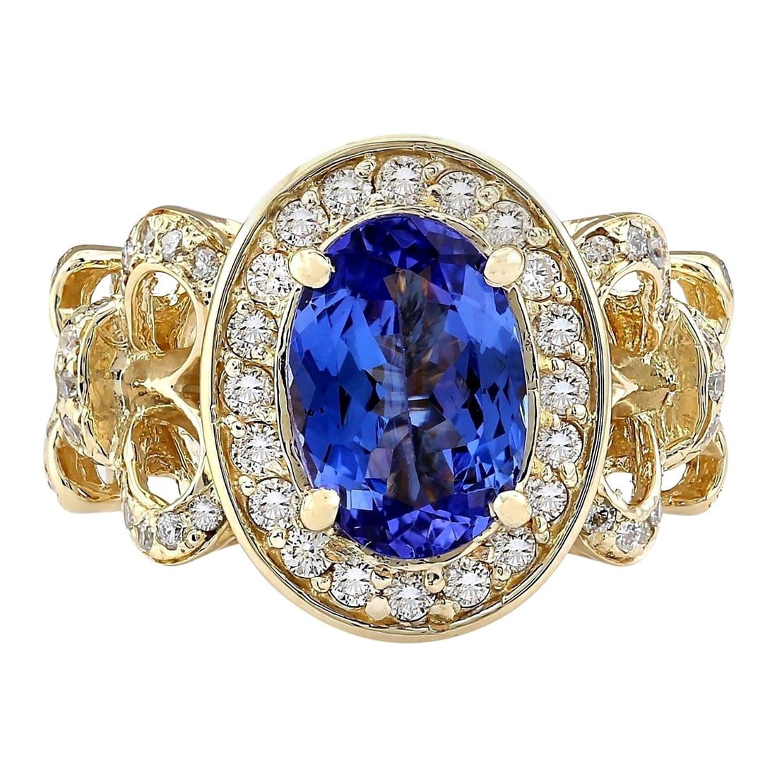 3.93 CTW Tanzanite 18K Yellow Gold Diamond Ring: 3.93 CTW Natural Tanzanite 18K Yellow Gold Diamond Ring Place of Origin: United States Period: 2010- Date of Manufacture: 2019 Condition: New Stamped: 18K Yellow Gold Total Ring Weight: 9.1 Grams Ring