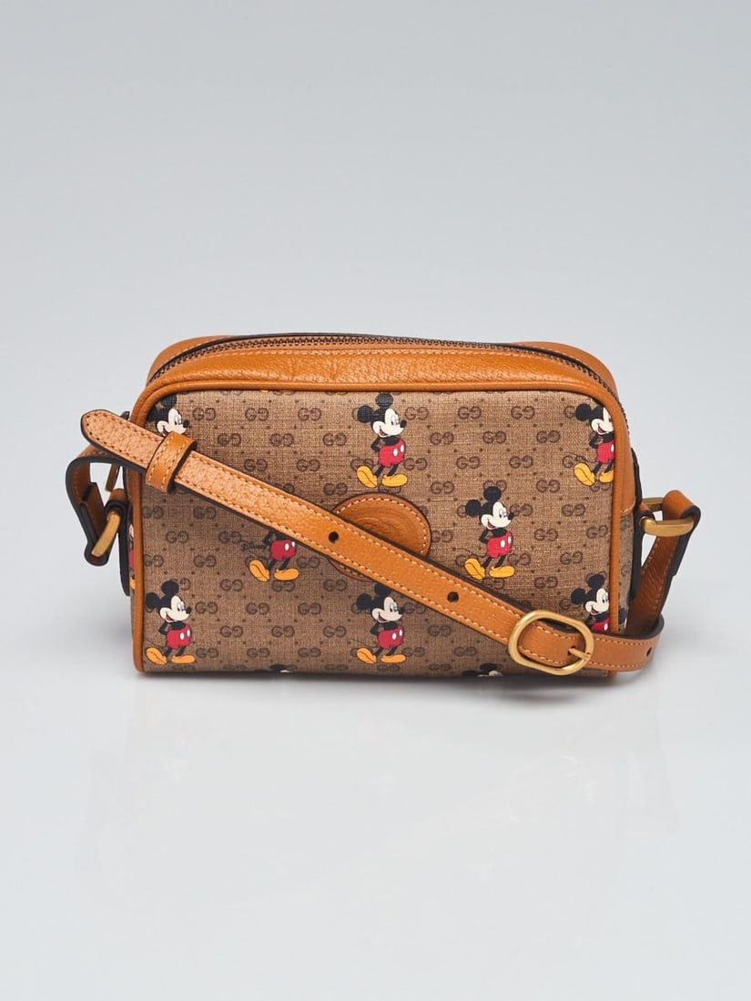 Gucci X Disney Brown GG: Gucci X Disney Brown GG Coated Canvas Mickey Mouse Mini Crossbody Bag Overall Condition: New Exterior Condition: New Interior Condition: New Designer: Gucci Material: Coated canvas and leather Inc